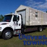 Tow truck service using flatbed with shed
